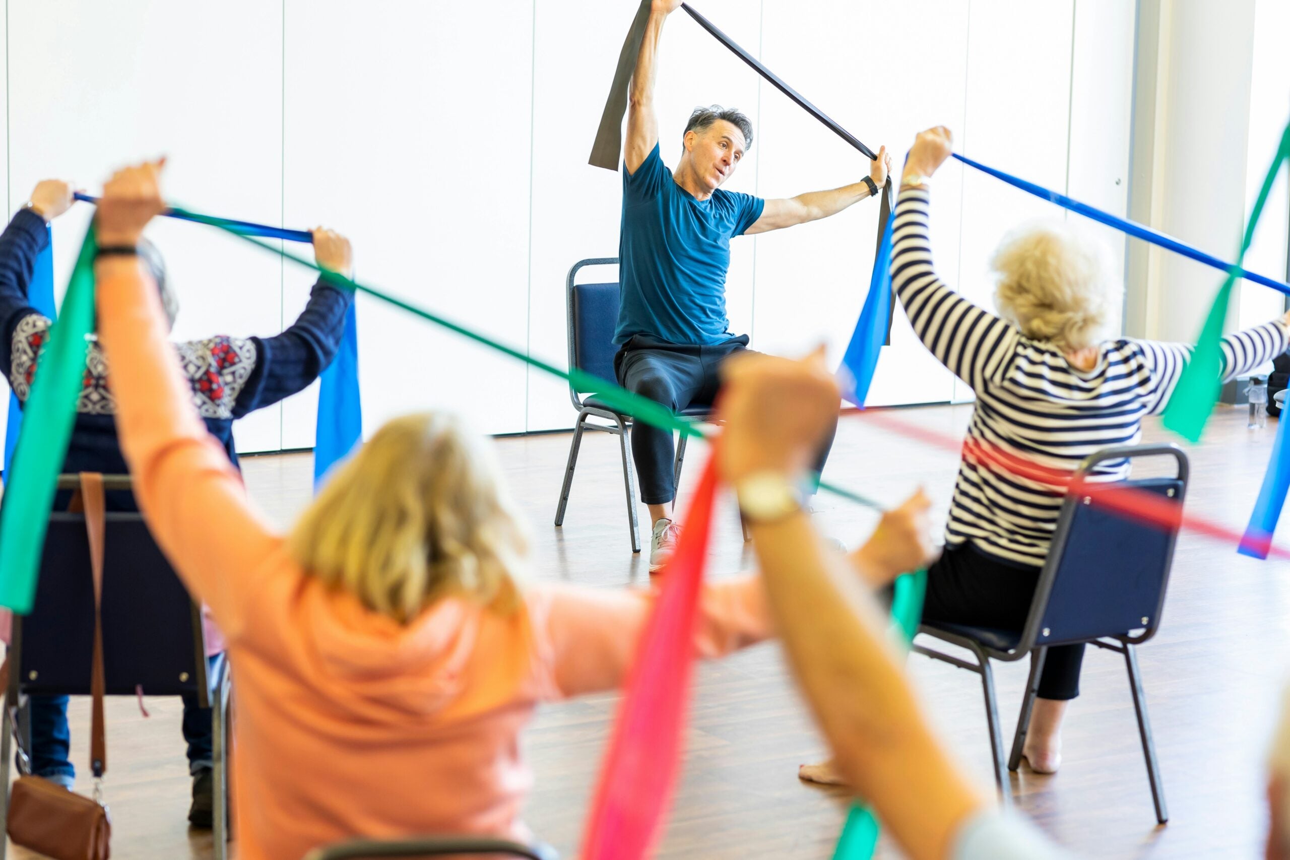 Caregiver supporting an older adult’s wellness and independence at home