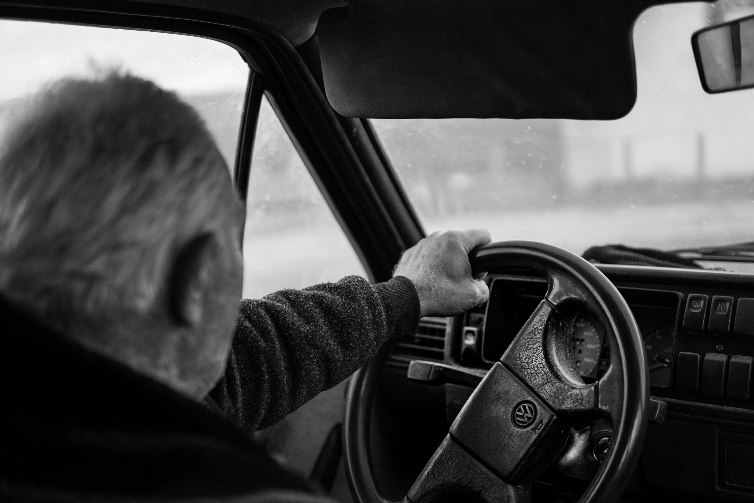 Older adult driving a car, illustrating common changes after age 80 and senior independence.